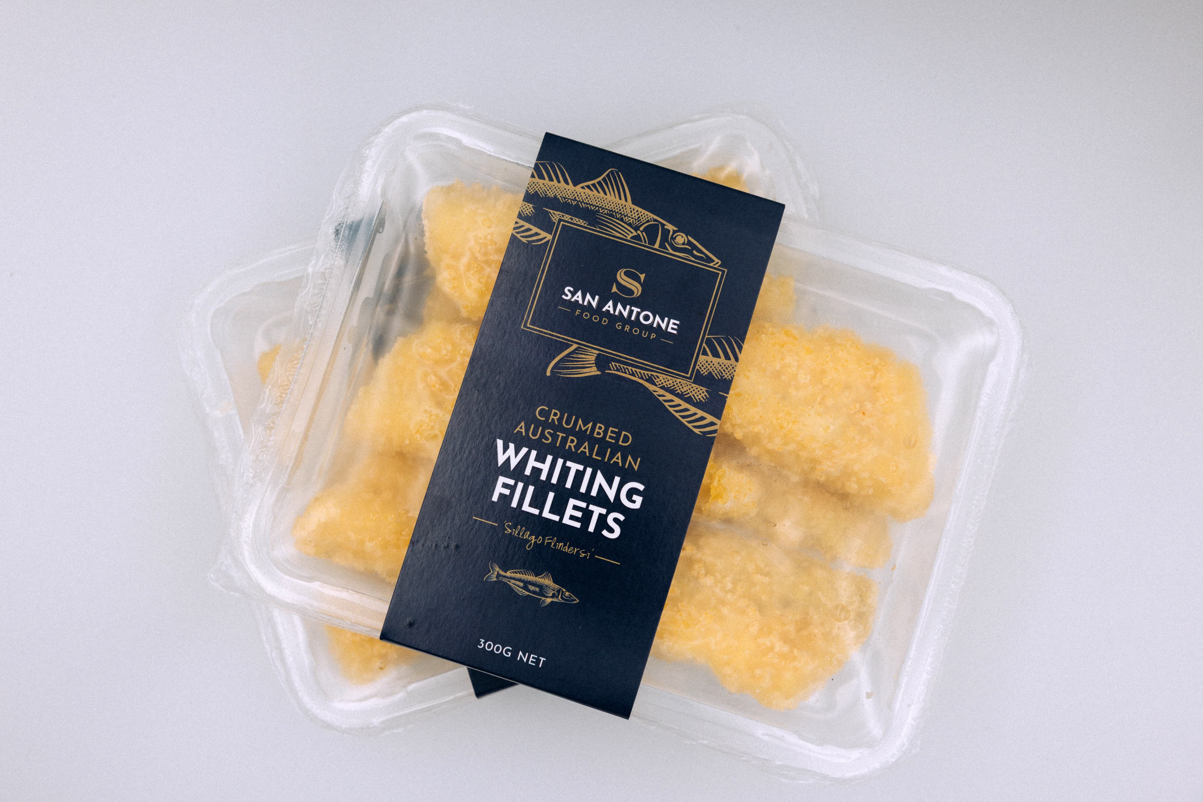 Crumbed Eastern School Whiting fillet plated at 45 degrees, golden and crisp